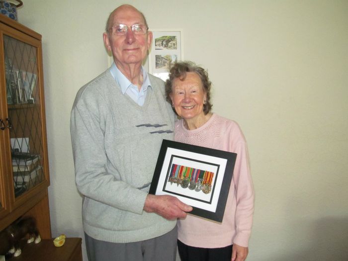 John Sugden 87 presents his friend Annie Owens also 87 with her Father Arthur Victor Austin of the Durham Light Infantry who fought in the 2nd World War. 
Medal's restored, court mounted and framed by Peter Postgate medalmount . 
Annie and John, dance 3 times a week to keep fit 